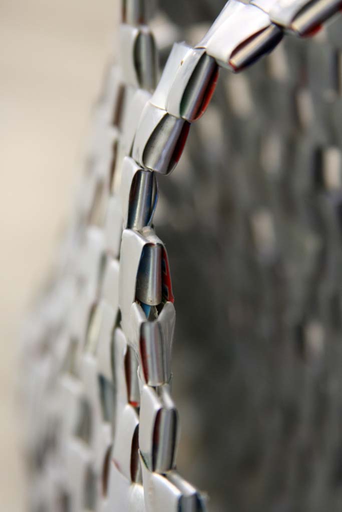 The same handbag - you can make out the coloured designs on the outside of the toothpaste tubes if you look closely enough.