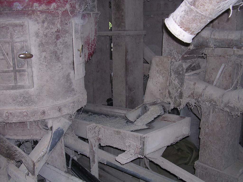 More rice going down a chute, heading for the bag