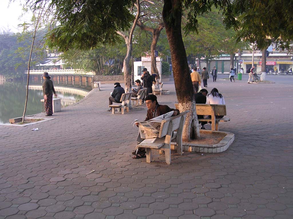 The woman by the water is doing her own thing (and not really about to dive in)