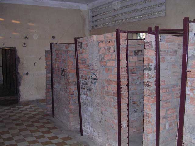 Cambodia: Phnom Penh - Tuol Sleng Genocide Museum: crude cells upstairs, some brick...